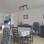 Vue d'entr&eacute;e salle &agrave; manger et cuisine